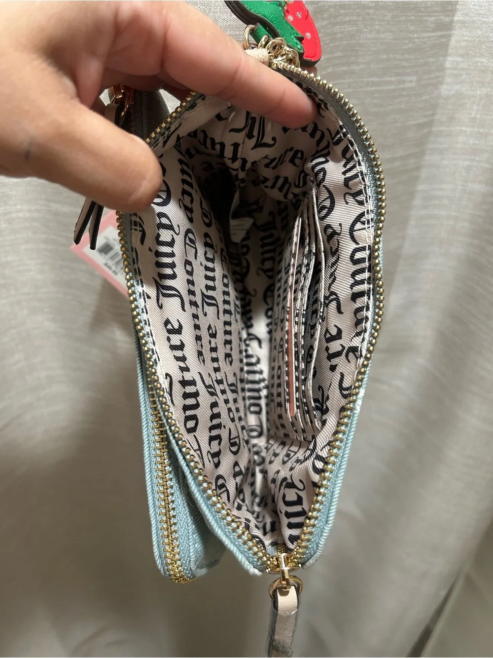 Juicy Couture Light Blue Monogram Cosmetic Wristlet with Strawberry Charm